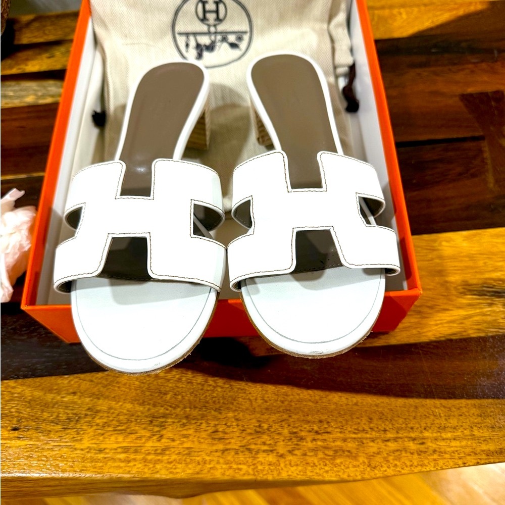 Hermes “H” Oasis White Sandals.